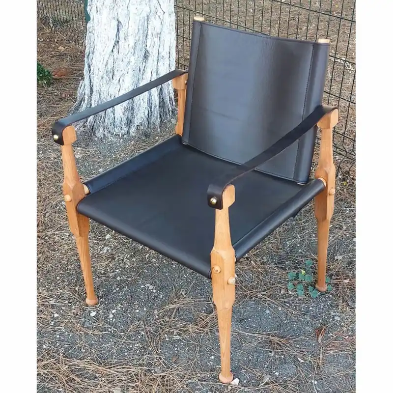 Preiswert Casa Padrino chaise de réalisateur de luxe en cuir avec accoudoirs noir / naturel - Meubles en cuir véritable