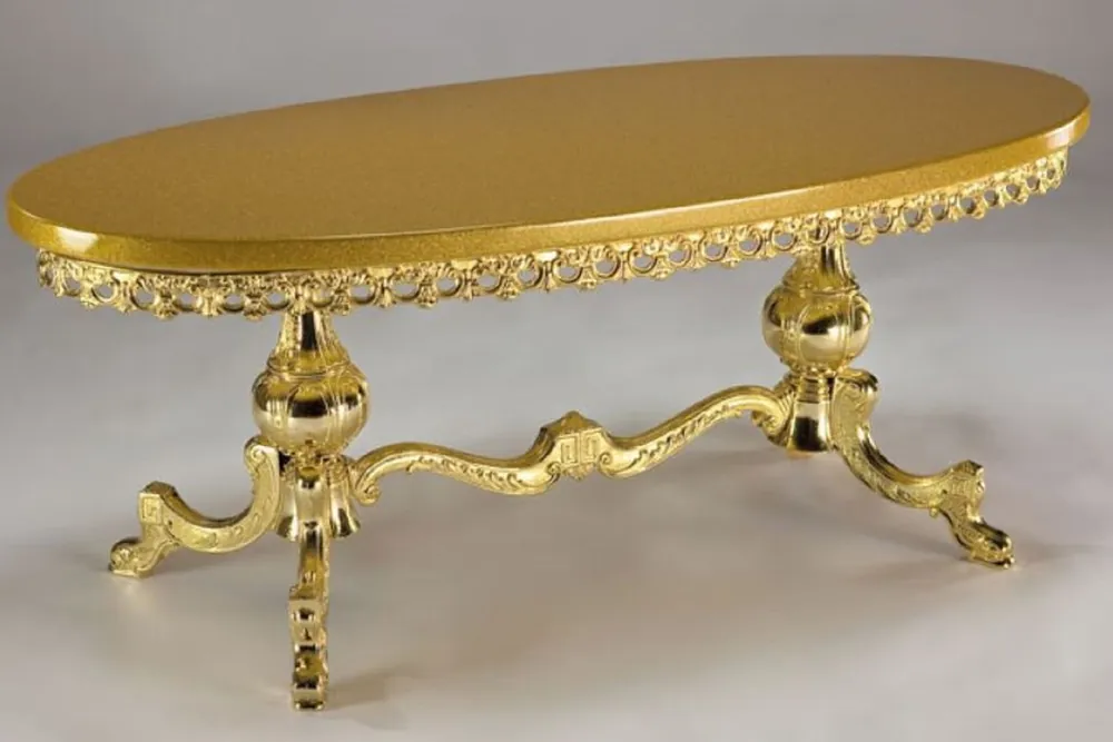 Ausverkauf Casa Padrino mesa de centro barroco de lujo oro 121 x 51 x A. 47 cm - Mesa de salón ovalada de latón con tablero de madera maciza - Muebles de salón en estilo barroco - Muebles barrocos nobles