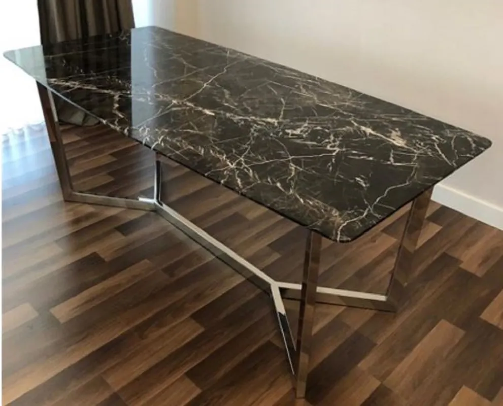Heißes Angebot Casa Padrino mesa de comedor de lujo negro / plata 200 x 100 x A. 75 cm - Mesa de cocina moderna con tablero de mármol y estructura de acero inoxidable - Muebles de comedor de lujo